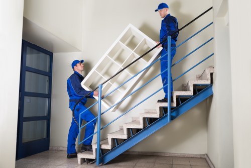 Removal team planning a move in Wandsworth residential street