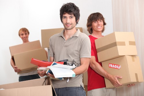 Removalists navigating stairs and access in a Wandsworth property