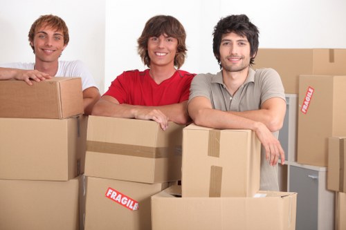 Moving crew handling furniture for House Removals in Wandsworth