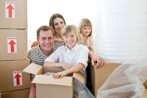 Careful loading of household items near a Wandsworth property