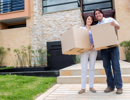 Professional movers handling furniture in a Wandsworth residential property